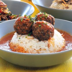 Delicious kofta balls in a rich tomato sauce, served w=ith Lebanese rice.